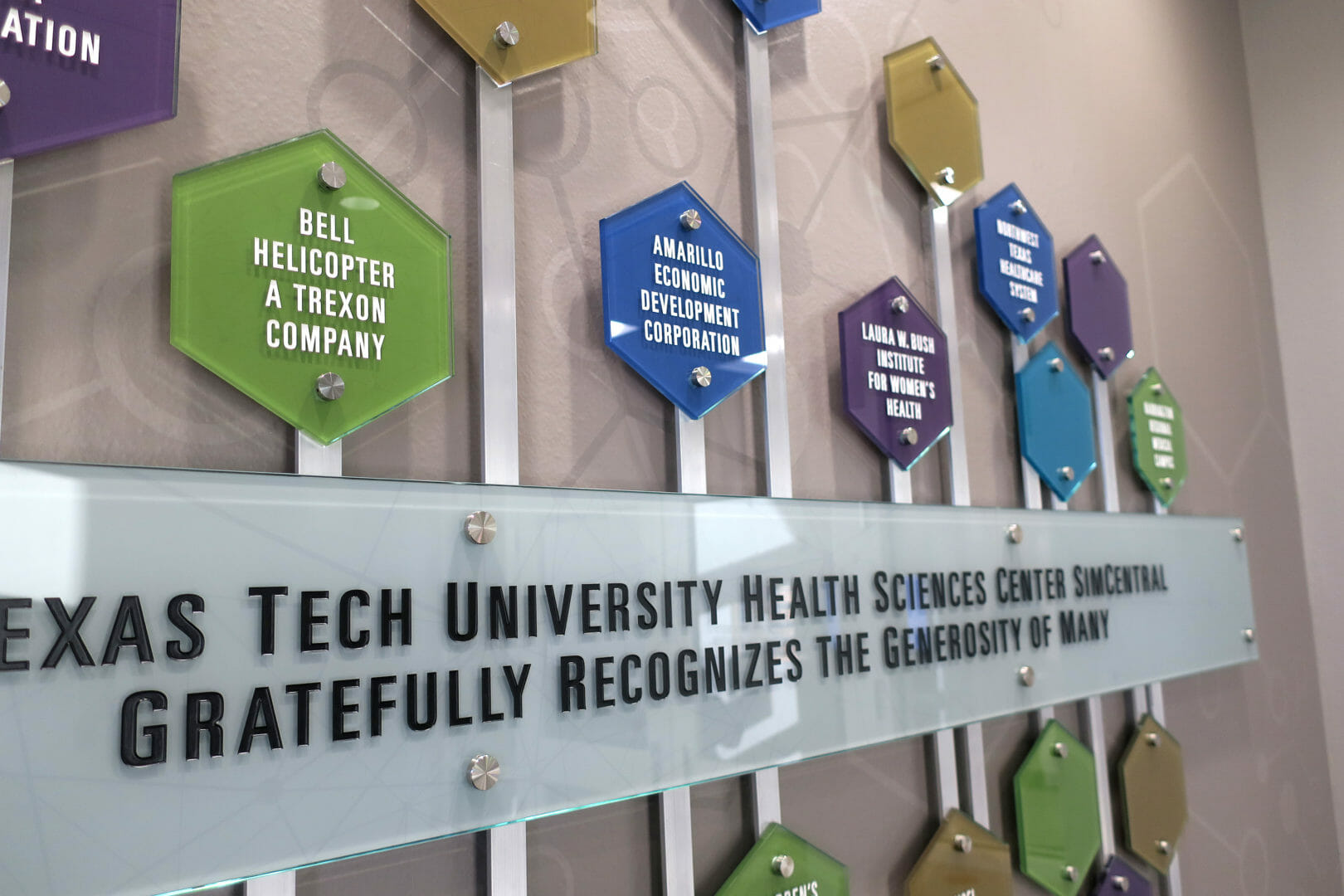 Texas Tech SimCenter lobby donor wall closeup