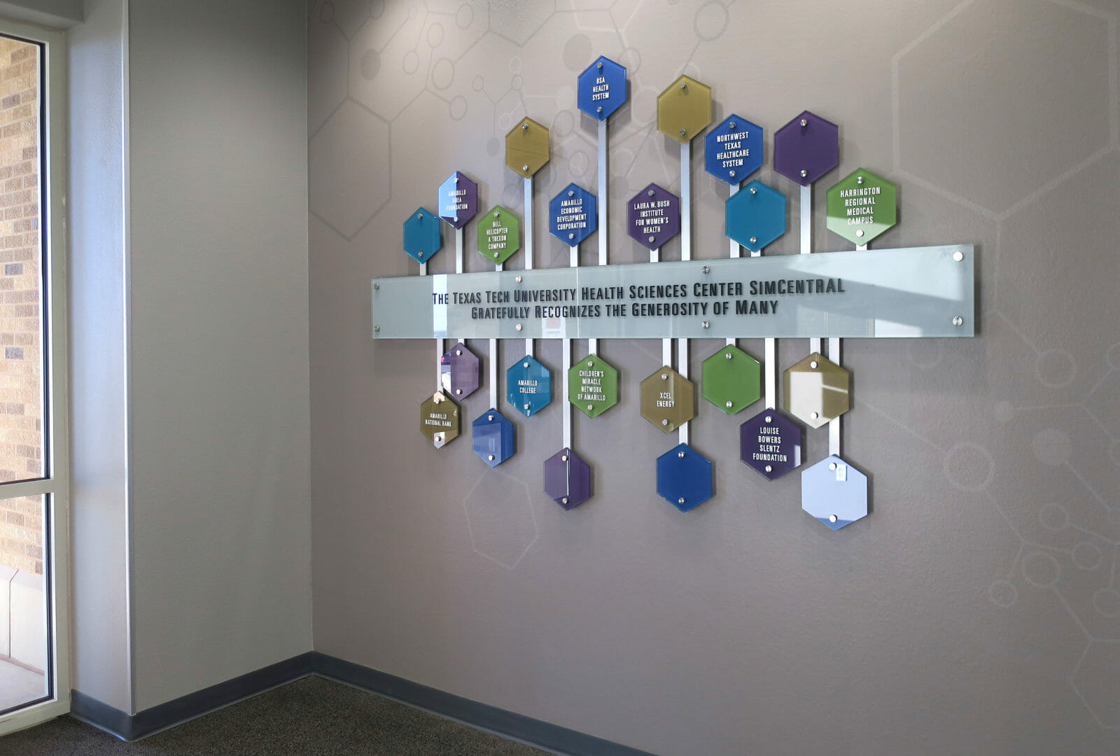 Texas Tech SimCenter lobby donor wall